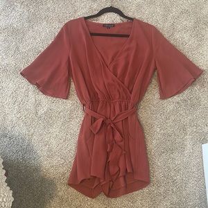 Rust color romper with tie around belt
